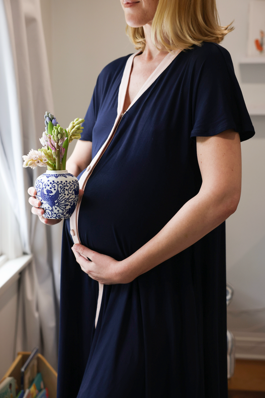 pregnant woman holding belly